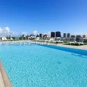 a view of a lake with a city