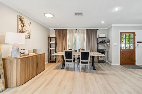a view of a dining room with furniture