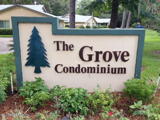 1237 The Grove Road, Unit 27 Orange Park, FL 32073 - Photo 10 of 11 entrance sign The Grove