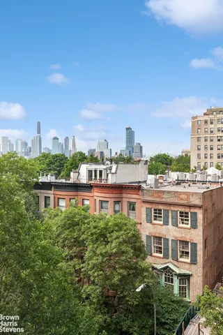 a view of a city with tall buildings