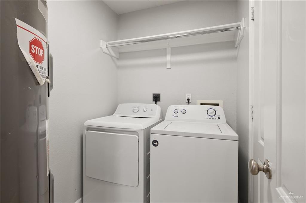 213 South 49th Street, Unit 2 McAllen, TX 78501 - Photo 16 of 23 a utility room with dryer and washer