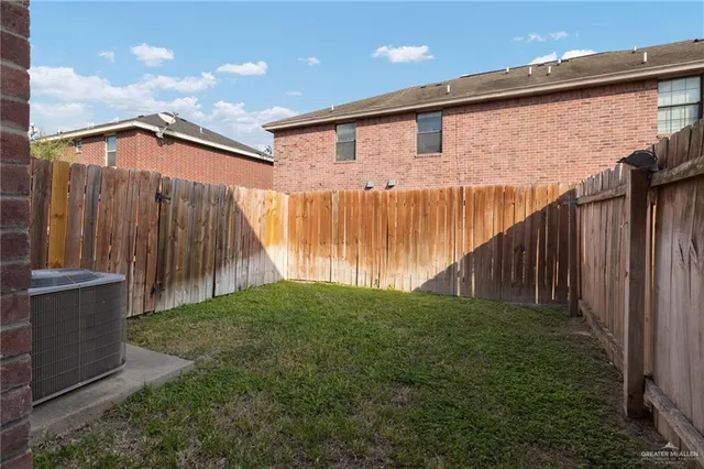 a backyard view with hardwood wall