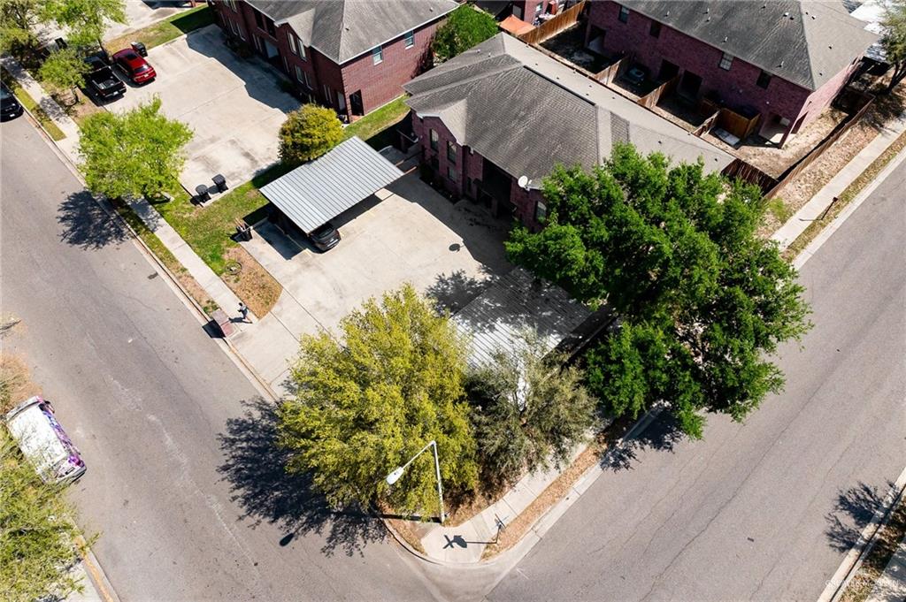 213 South 49th Street, Unit 2 McAllen, TX 78501 - Photo 20 of 23 an aerial view of a house with a yard and garden