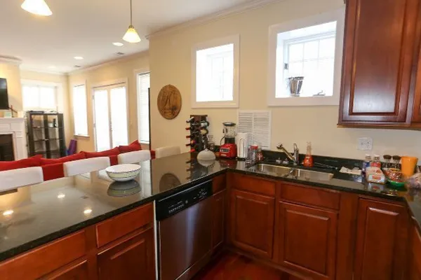 a kitchen with sink and window