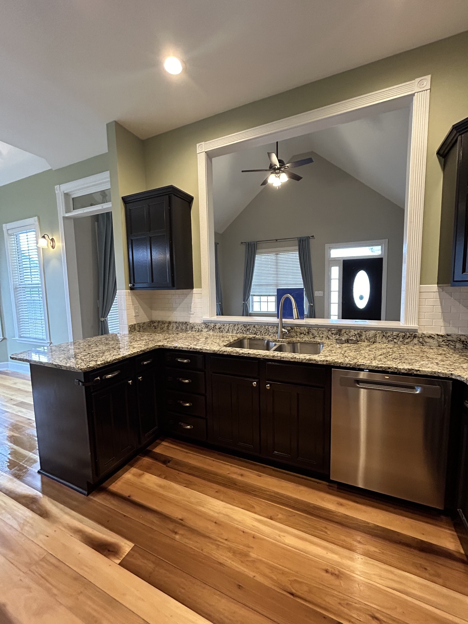 834 Blakemore Road Dickson, TN 37055 - Photo 13 of 26 a bathroom with a granite countertop sink a large mirror and a bathtub