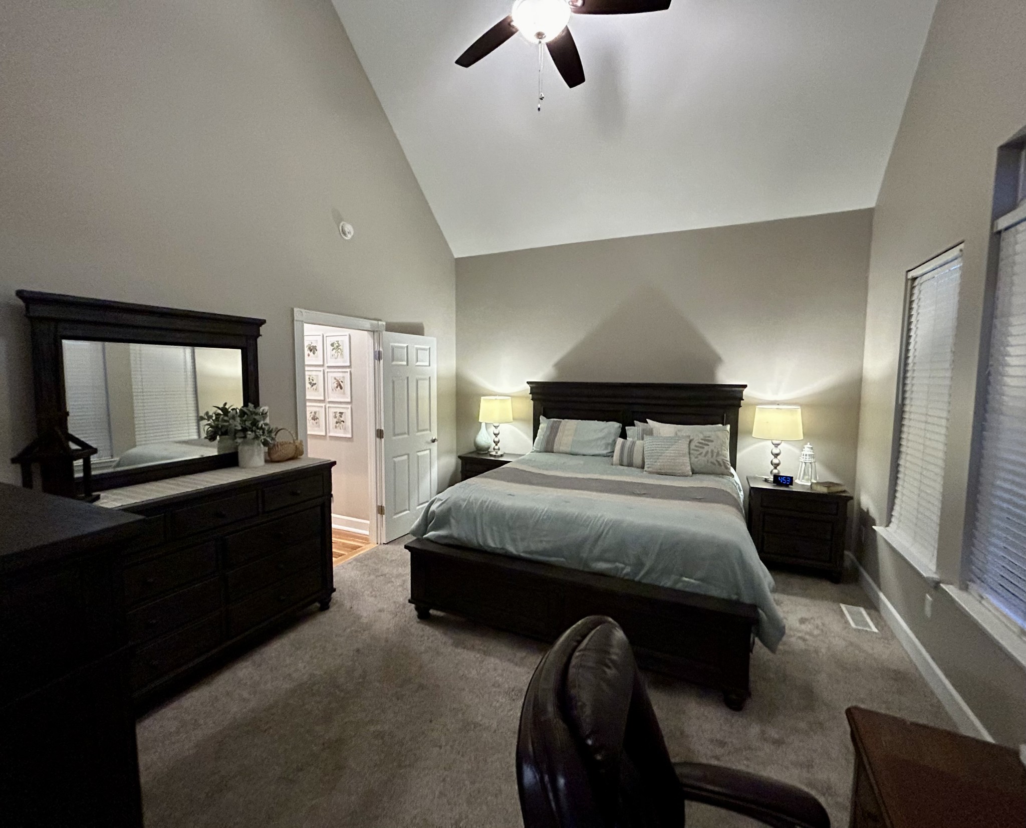 834 Blakemore Road Dickson, TN 37055 - Photo 18 of 26 a bedroom with a bed and wooden floor