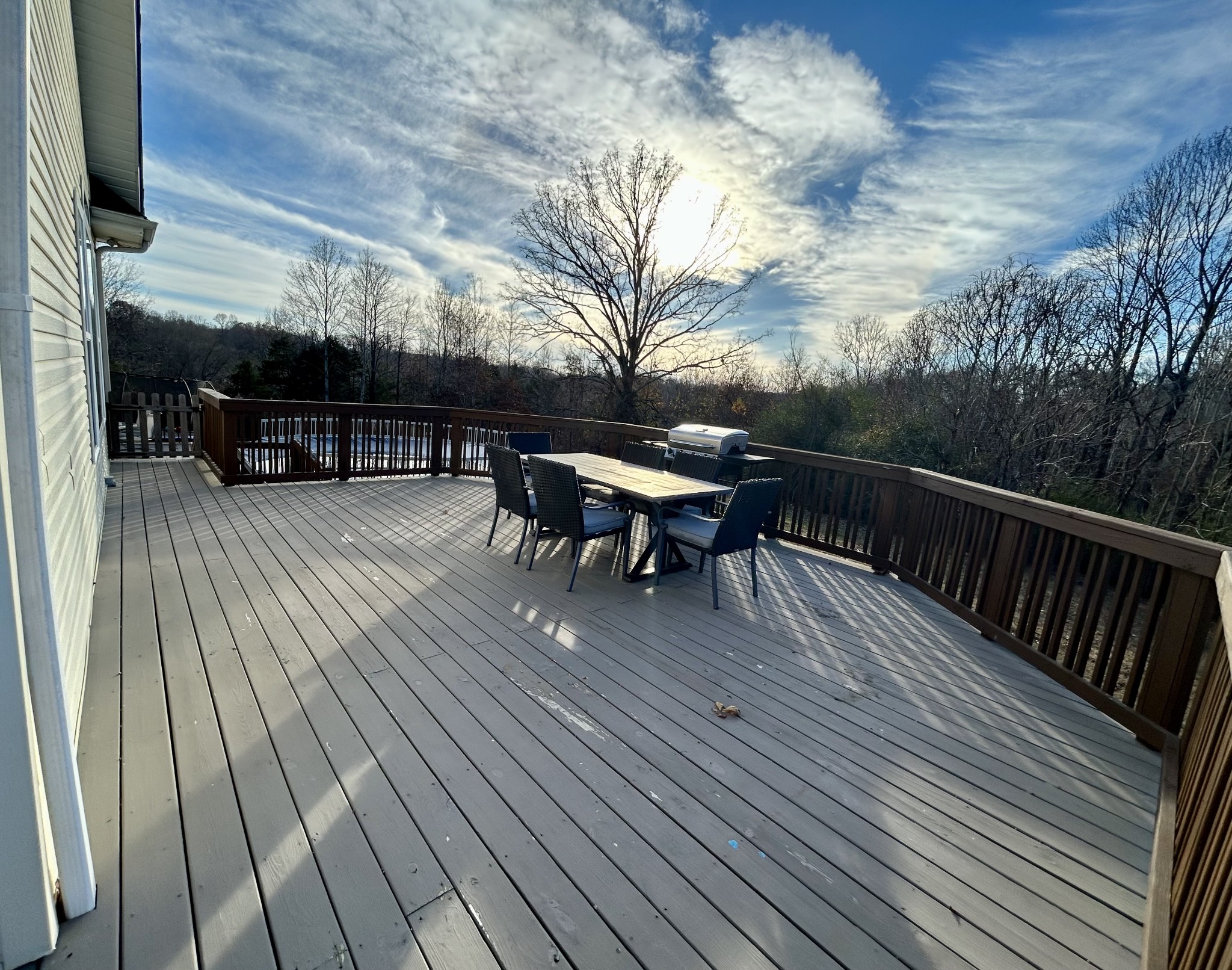 834 Blakemore Road Dickson, TN 37055 - Photo 26 of 26 a balcony with wooden floor table and chairs