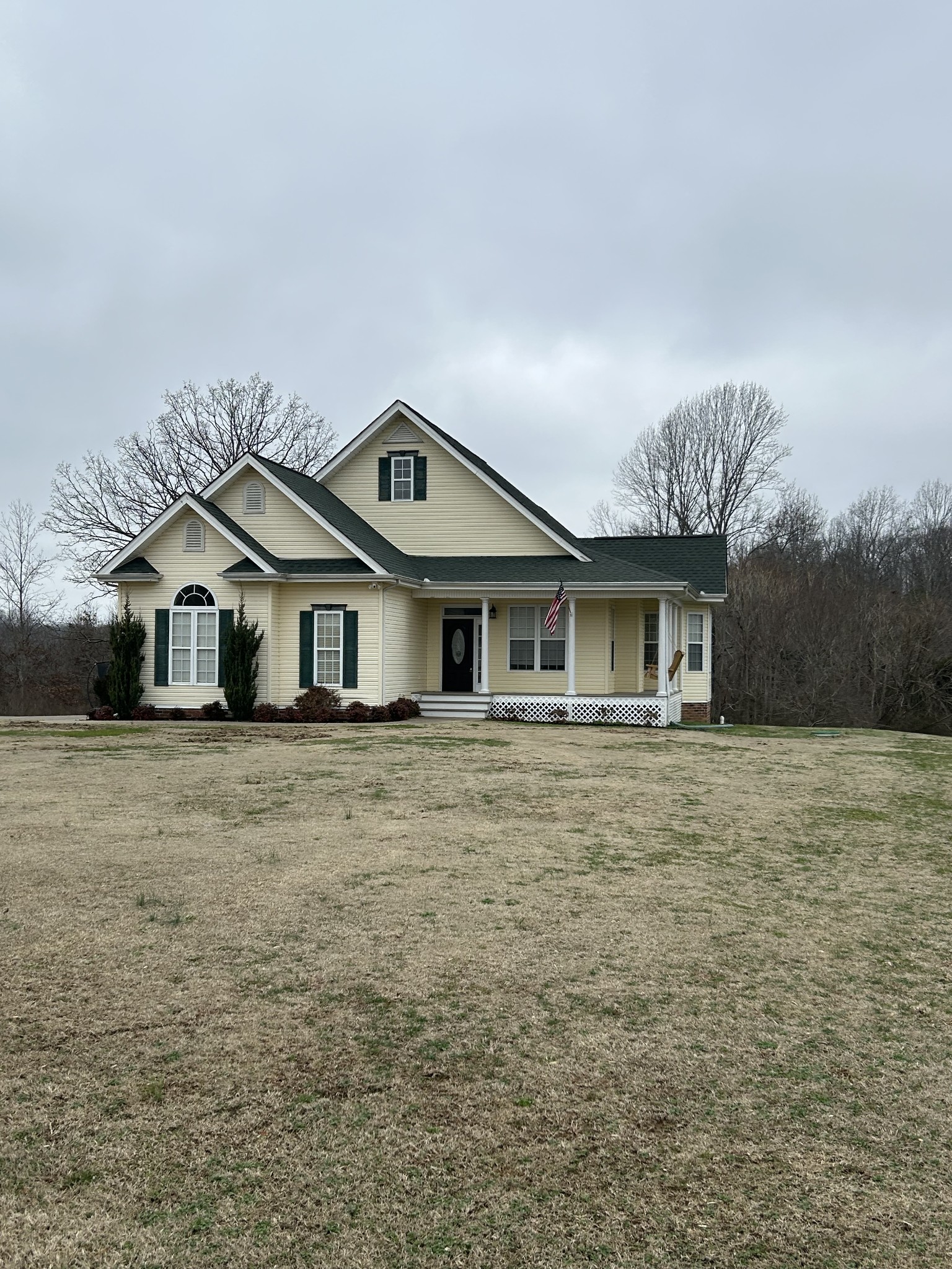 834 Blakemore Road Dickson, TN 37055 - Photo 3 of 26 a front view of a house with a garden
