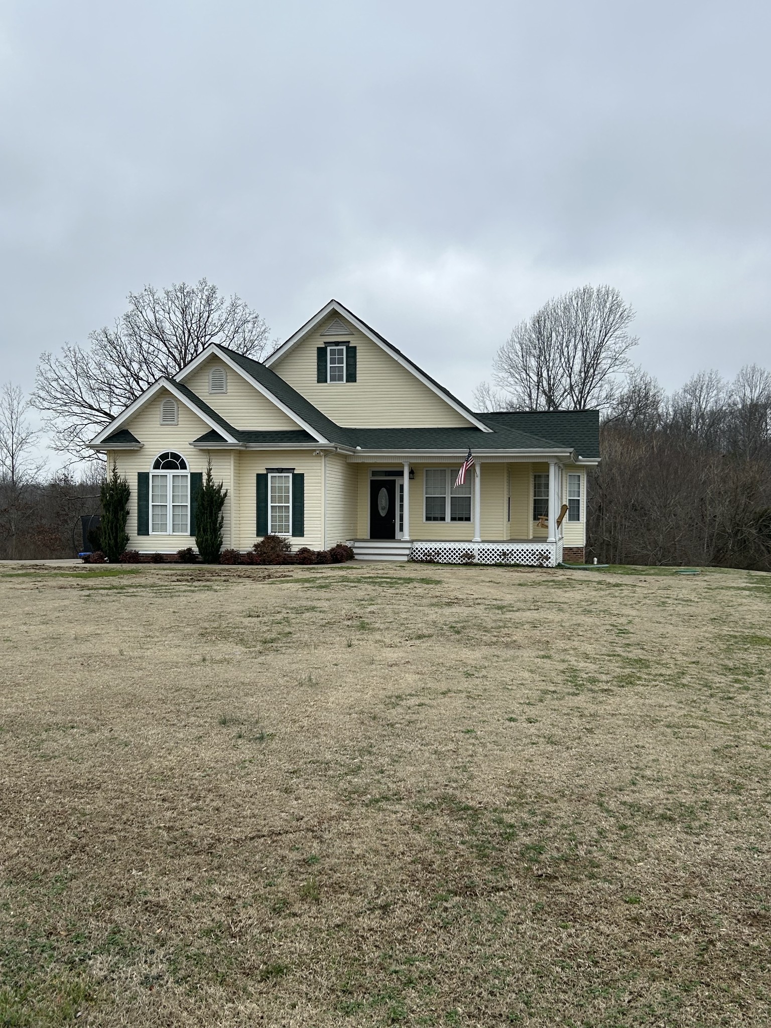 834 Blakemore Road Dickson, TN 37055 - Photo 4 of 26 a front view of a house with a garden