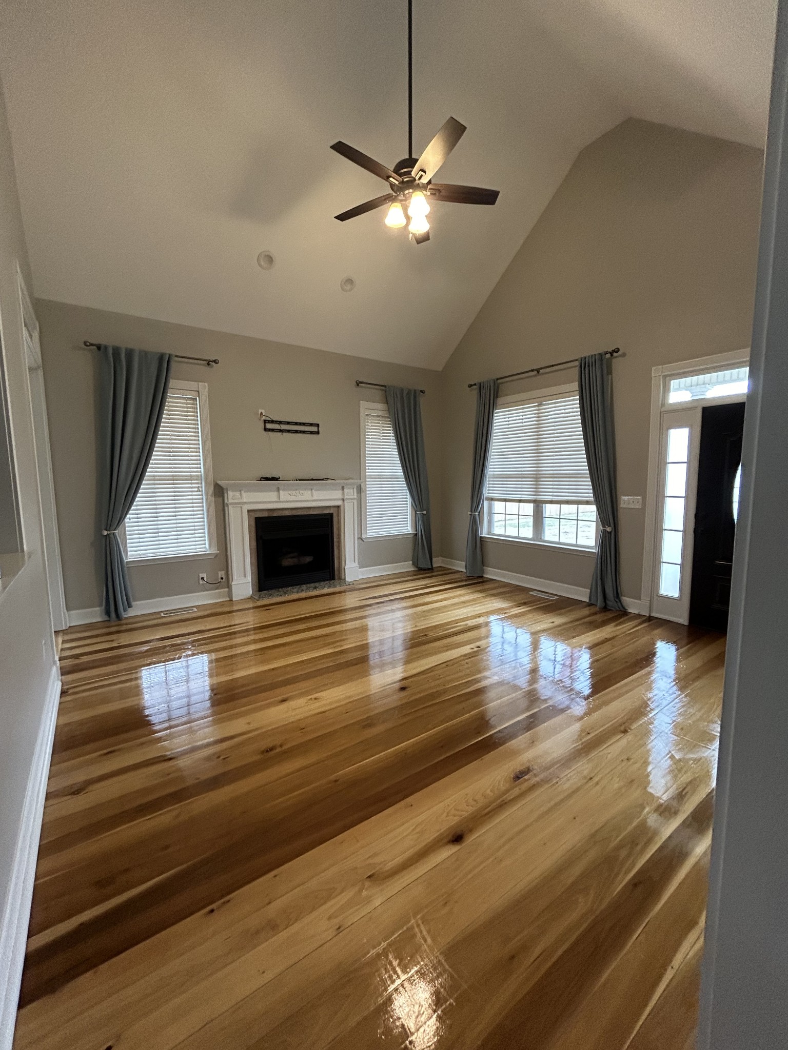 834 Blakemore Road Dickson, TN 37055 - Photo 9 of 26 a view of an empty room window and wooden floor