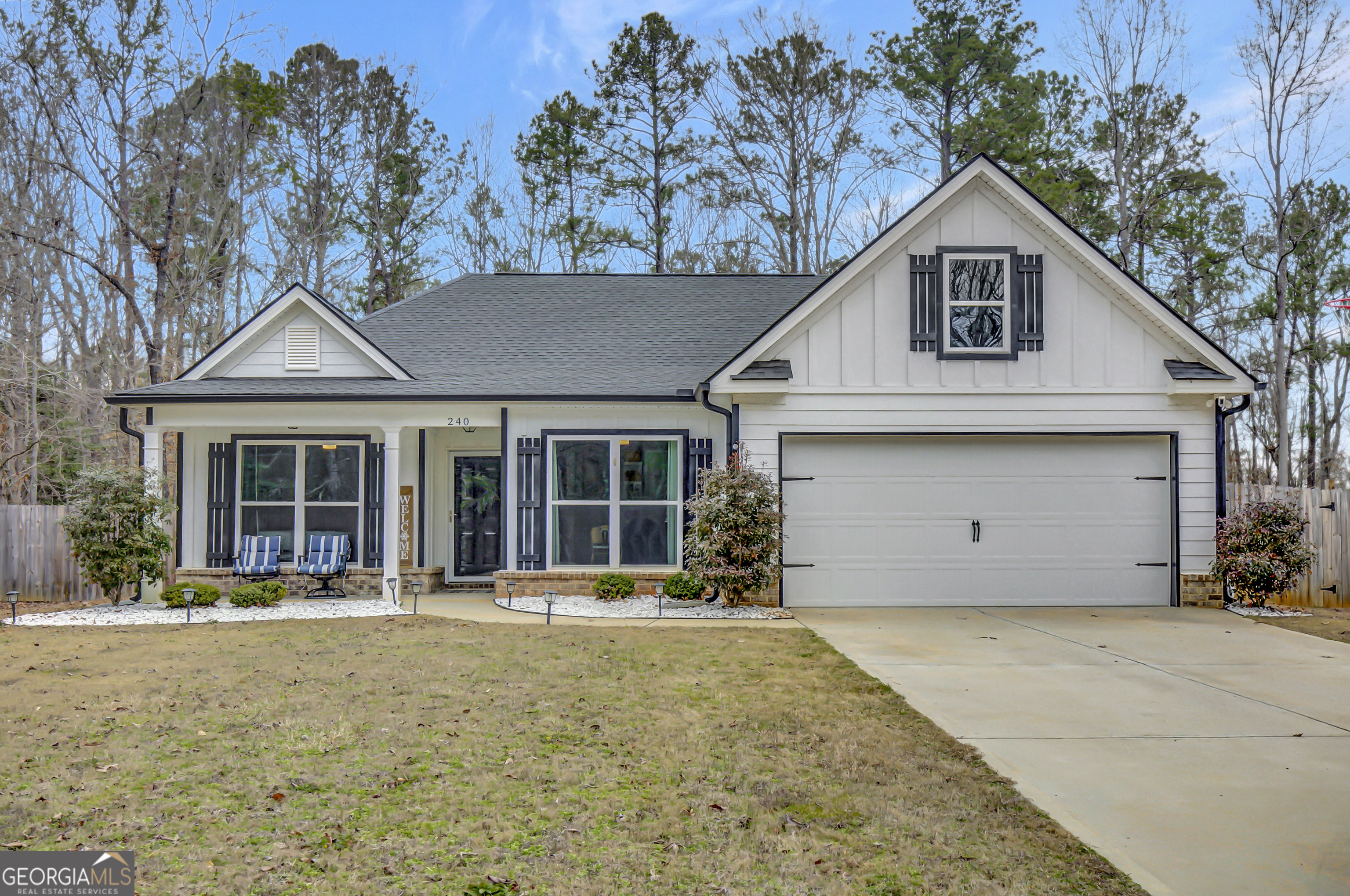 240 Avalee Road Brooks, GA 30205 - Photo 1 of 1 a front view of a house with a yard