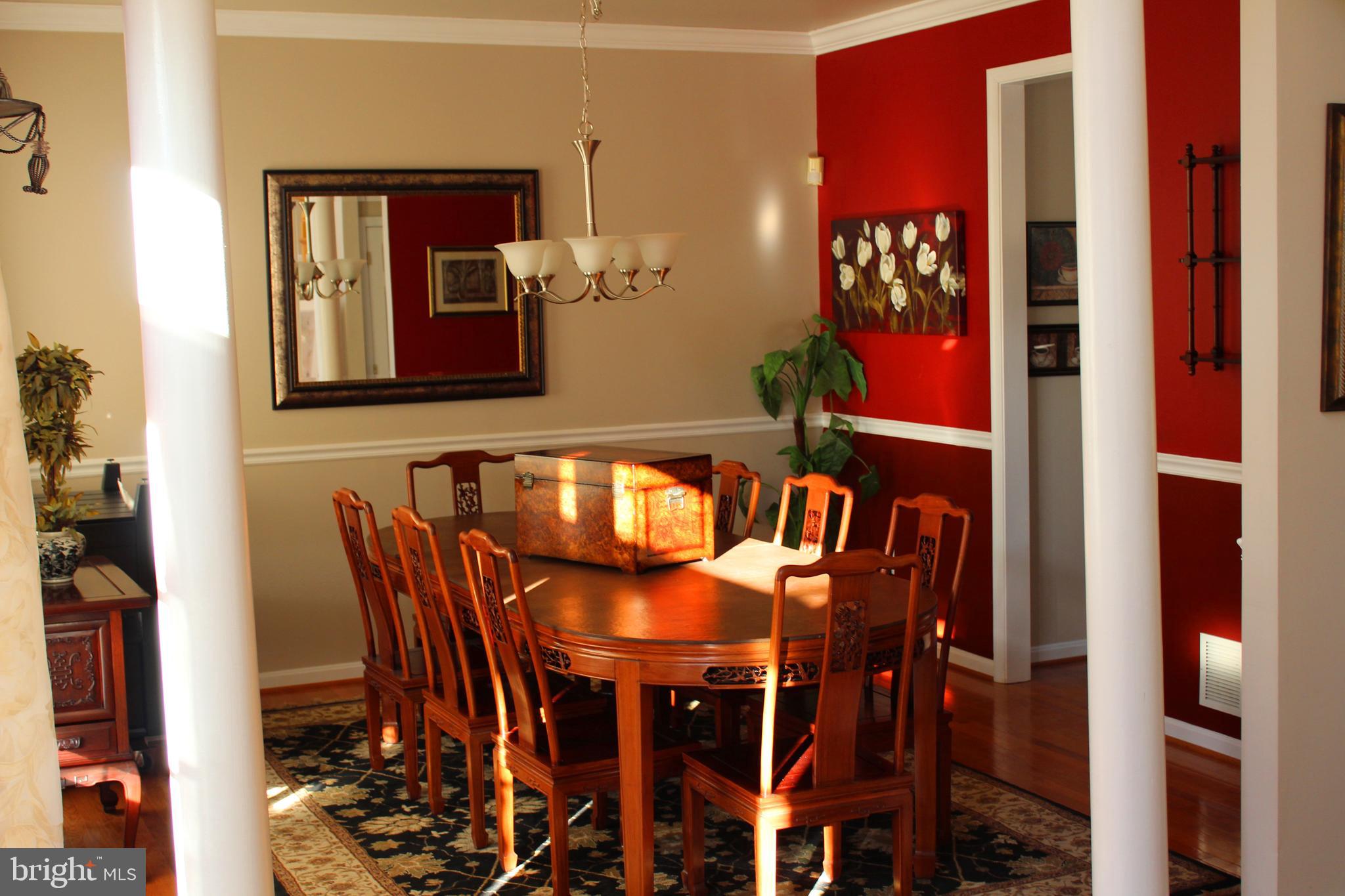 8385 Maryland Road Pasadena, MD 21122 - Photo 4 of 21 Open Formal Dining room area, seats 10/12 people