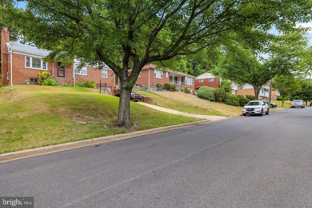 a car parked in front of a house