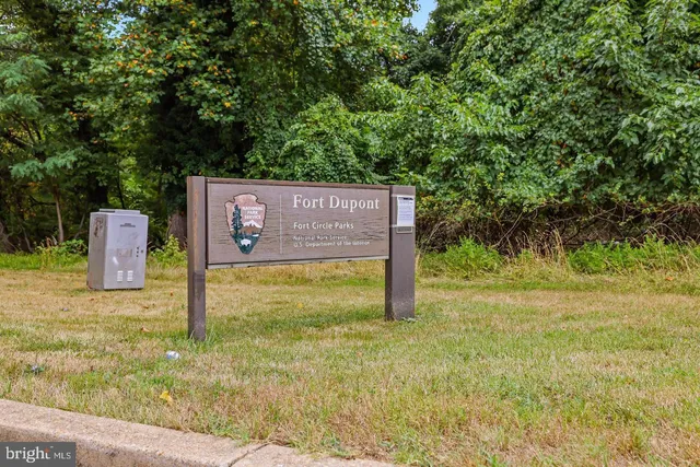 a view of a chairs and table in the patio