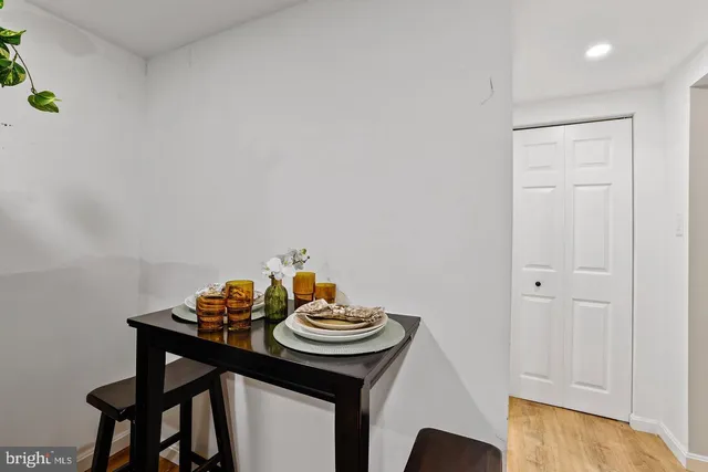 a table and a sink in a kitchen