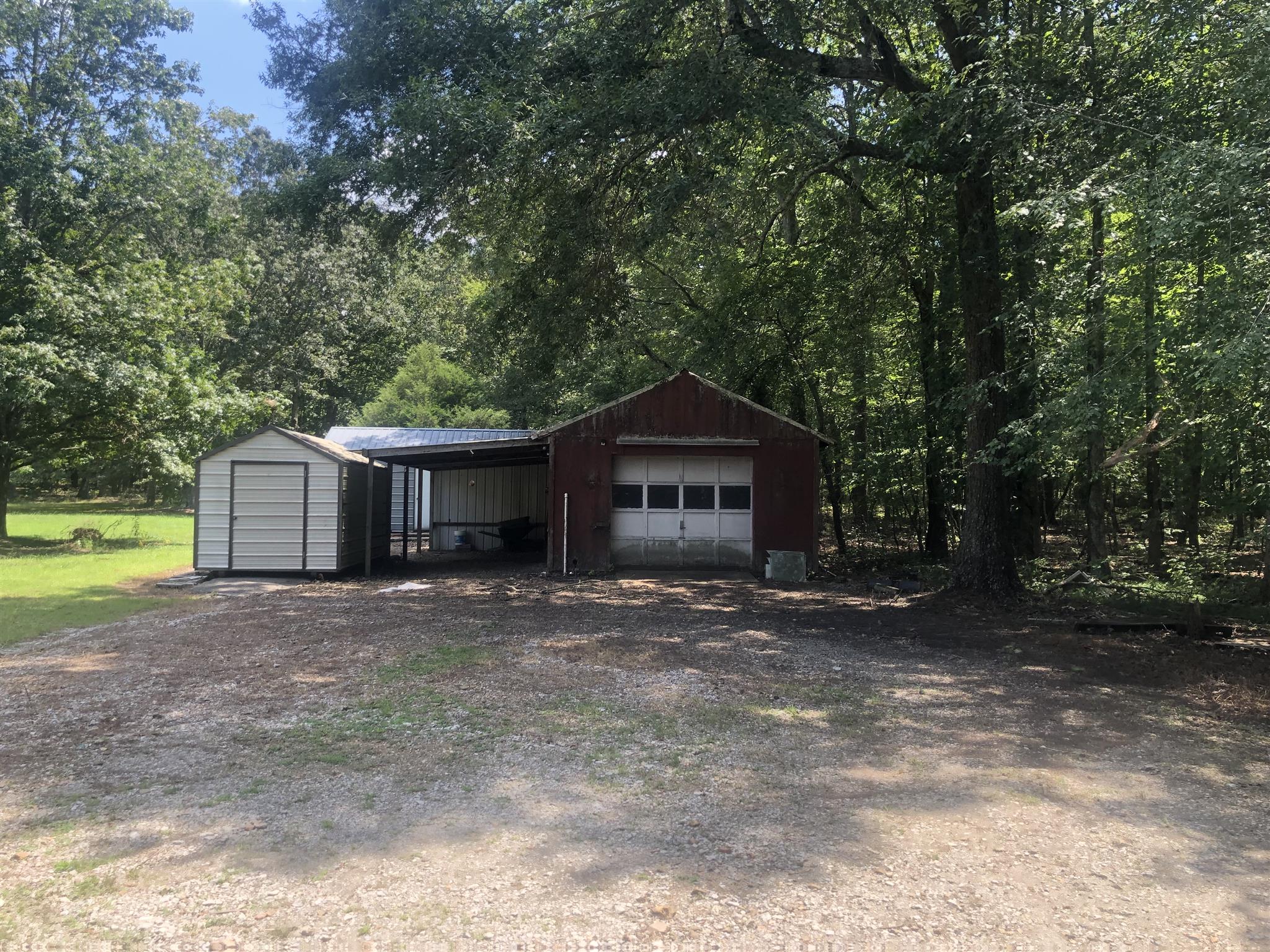 536 Boynton Valley Road Manchester, TN 37355 - Photo 3 of 10 a front view of a house with a yard and garage