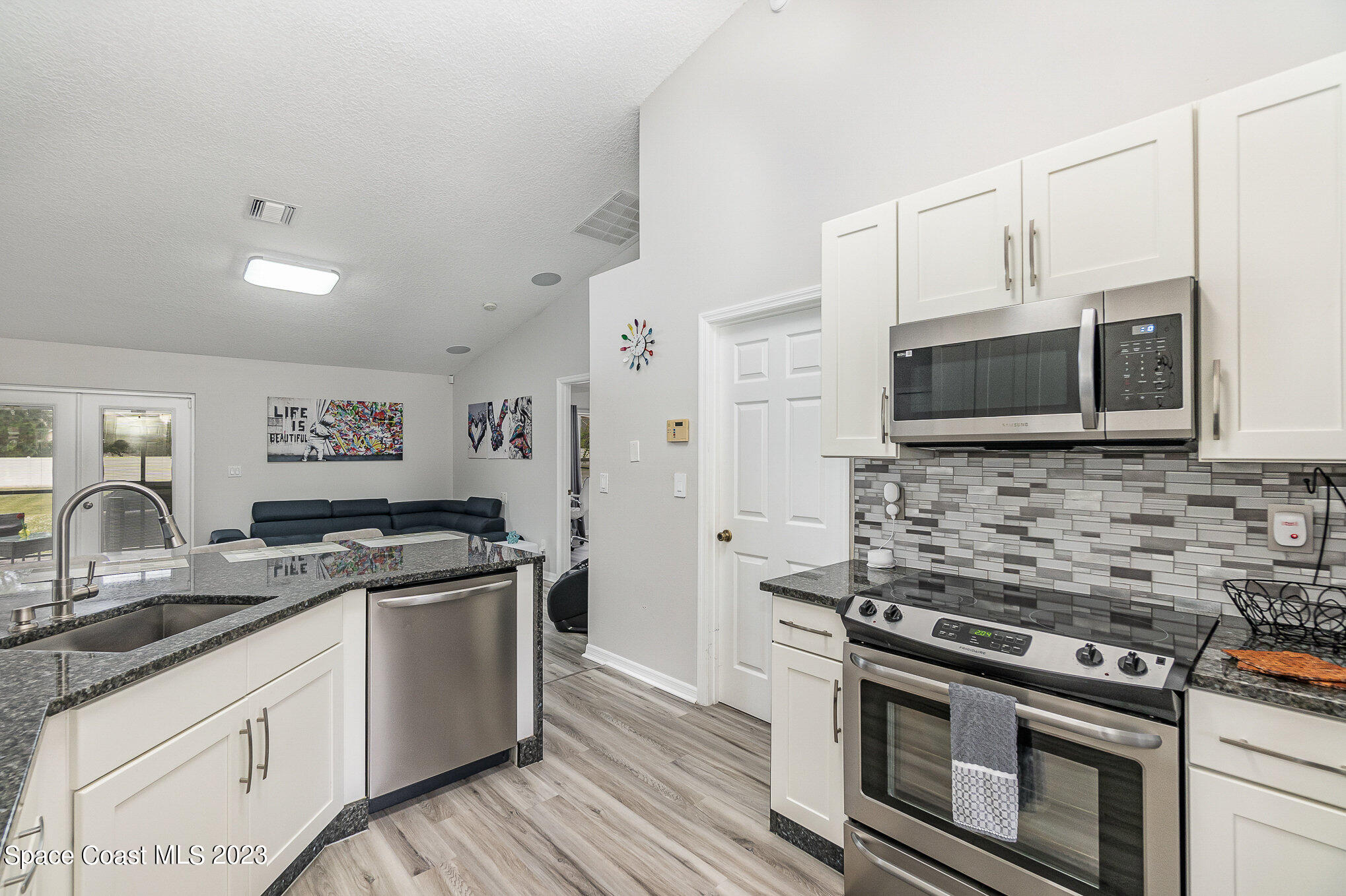 3107 Telesca Road Southeast Palm Bay, FL 32909 - Photo 5 of 35 009_3107_telesea_rd_27-edit