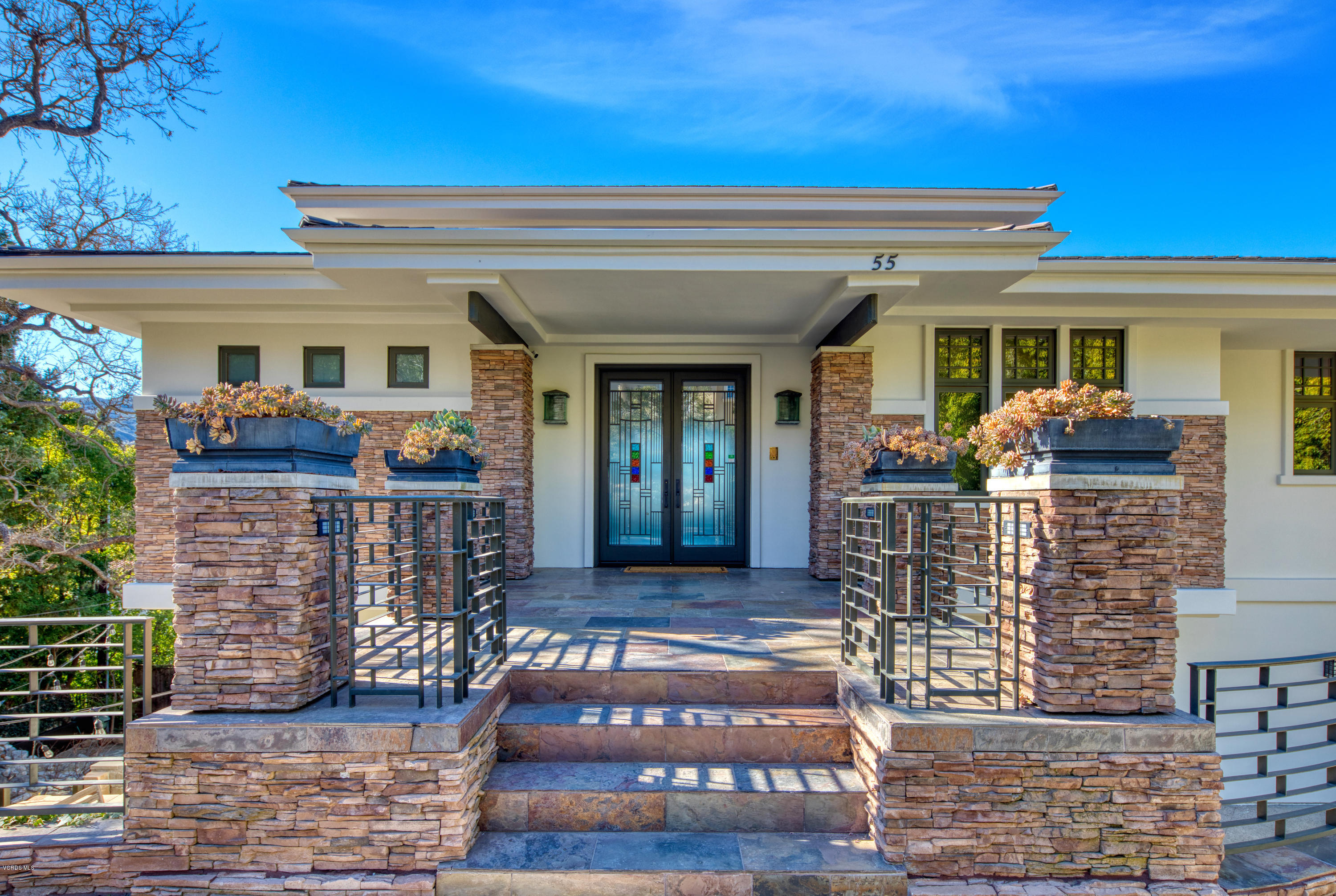 55 Upper Lake Road Westlake Village, CA 91361 - Photo 1 of 40 front view of a house with large windows