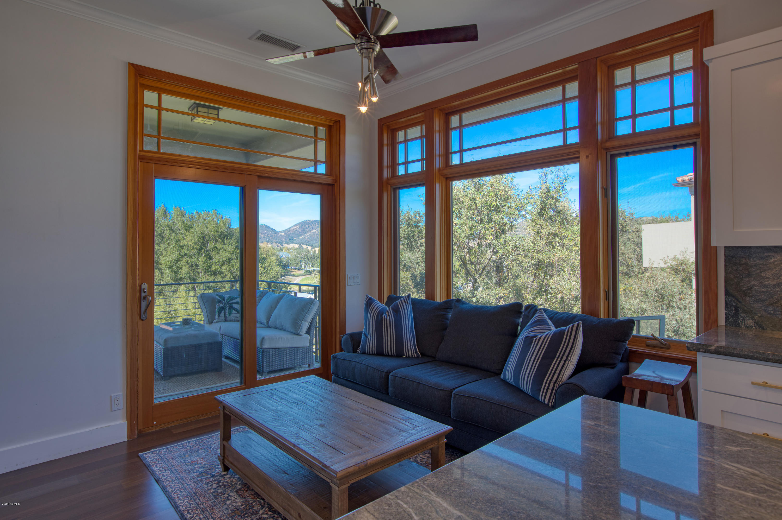 55 Upper Lake Road Westlake Village, CA 91361 - Photo 14 of 40 a living room with furniture and a floor to ceiling window