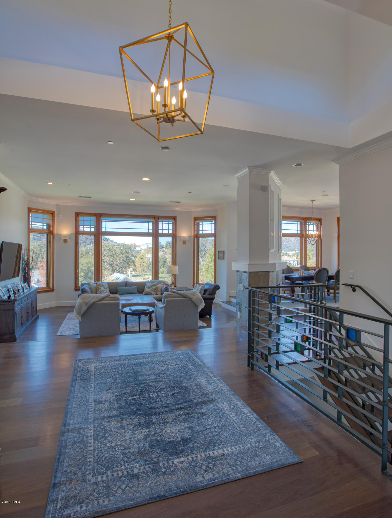 55 Upper Lake Road Westlake Village, CA 91361 - Photo 17 of 40 a view of a dining room with furniture window and wooden floor