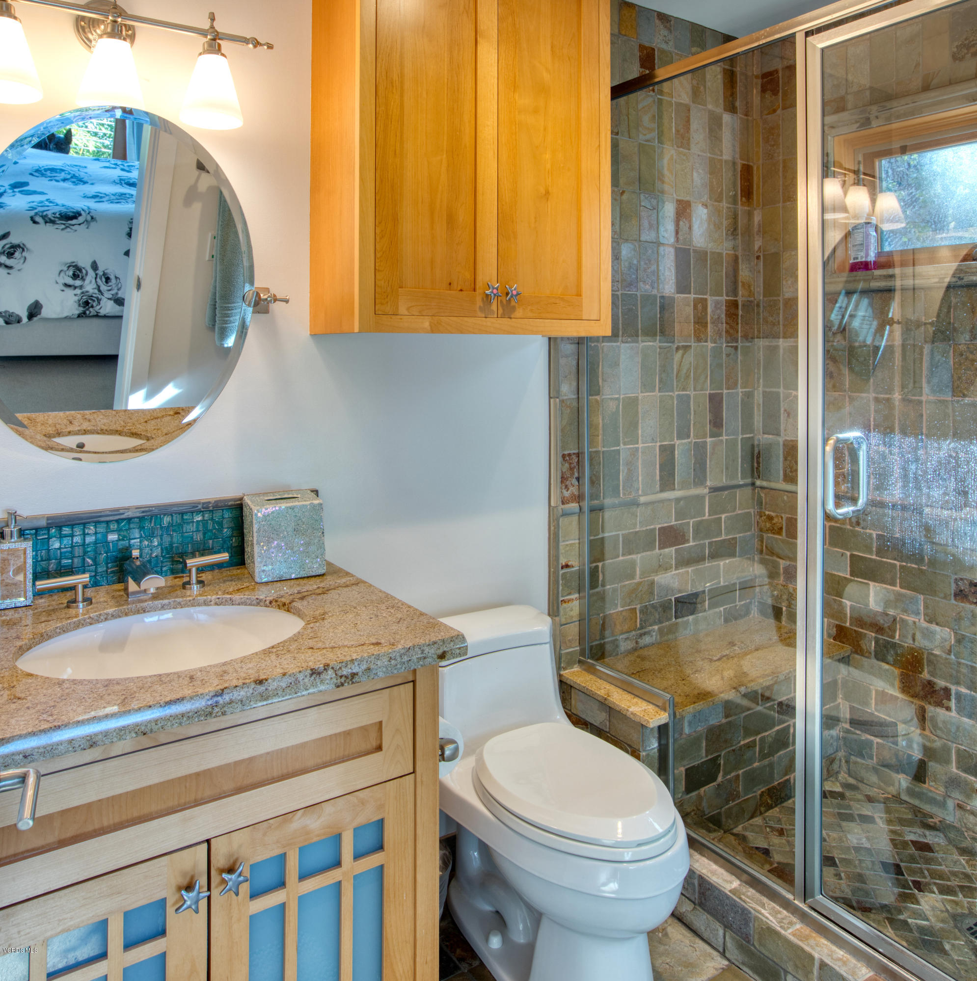 55 Upper Lake Road Westlake Village, CA 91361 - Photo 22 of 40 a bathroom with a sink a toilet and shower