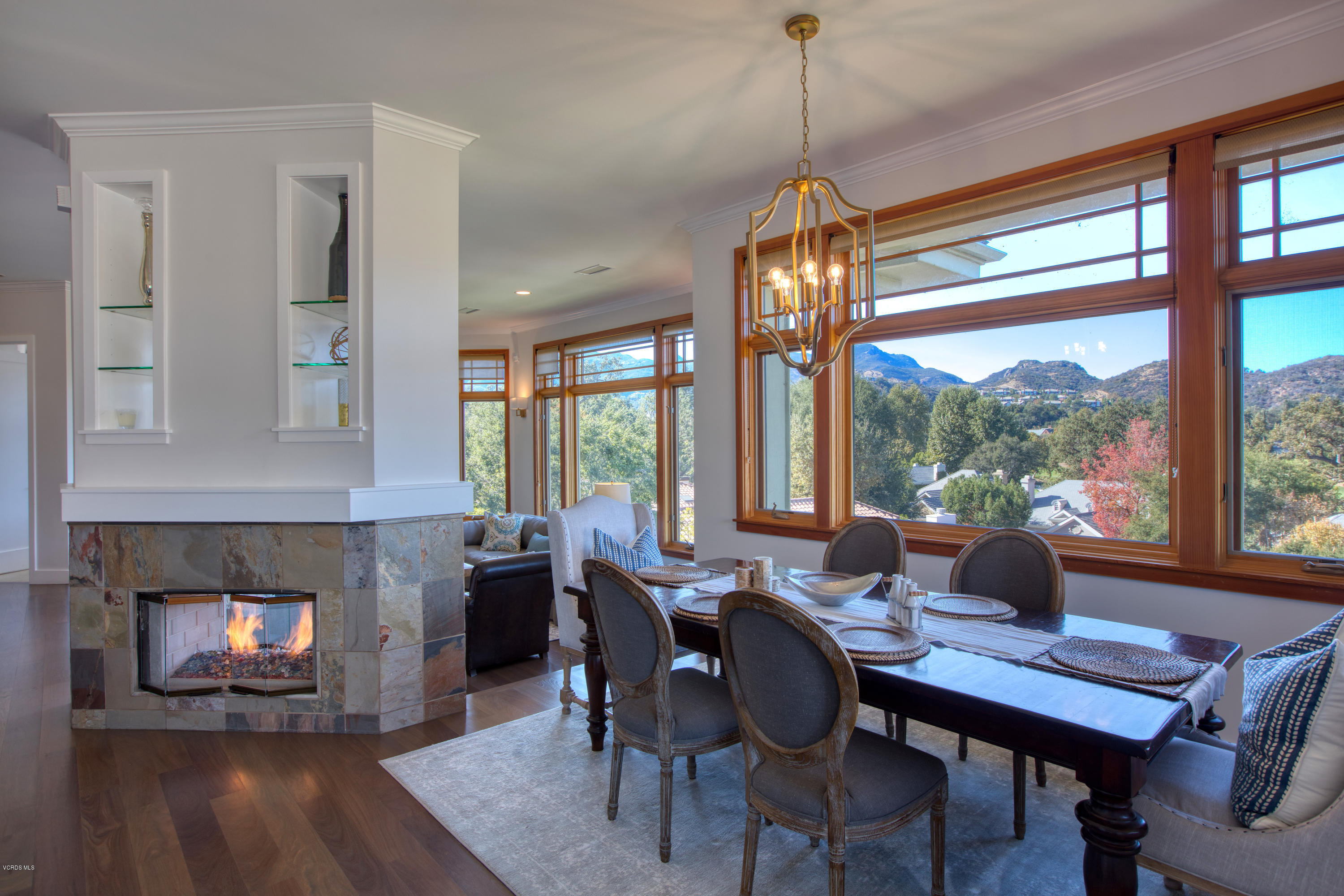 55 Upper Lake Road Westlake Village, CA 91361 - Photo 26 of 40 a dining room with furniture window wooden floor