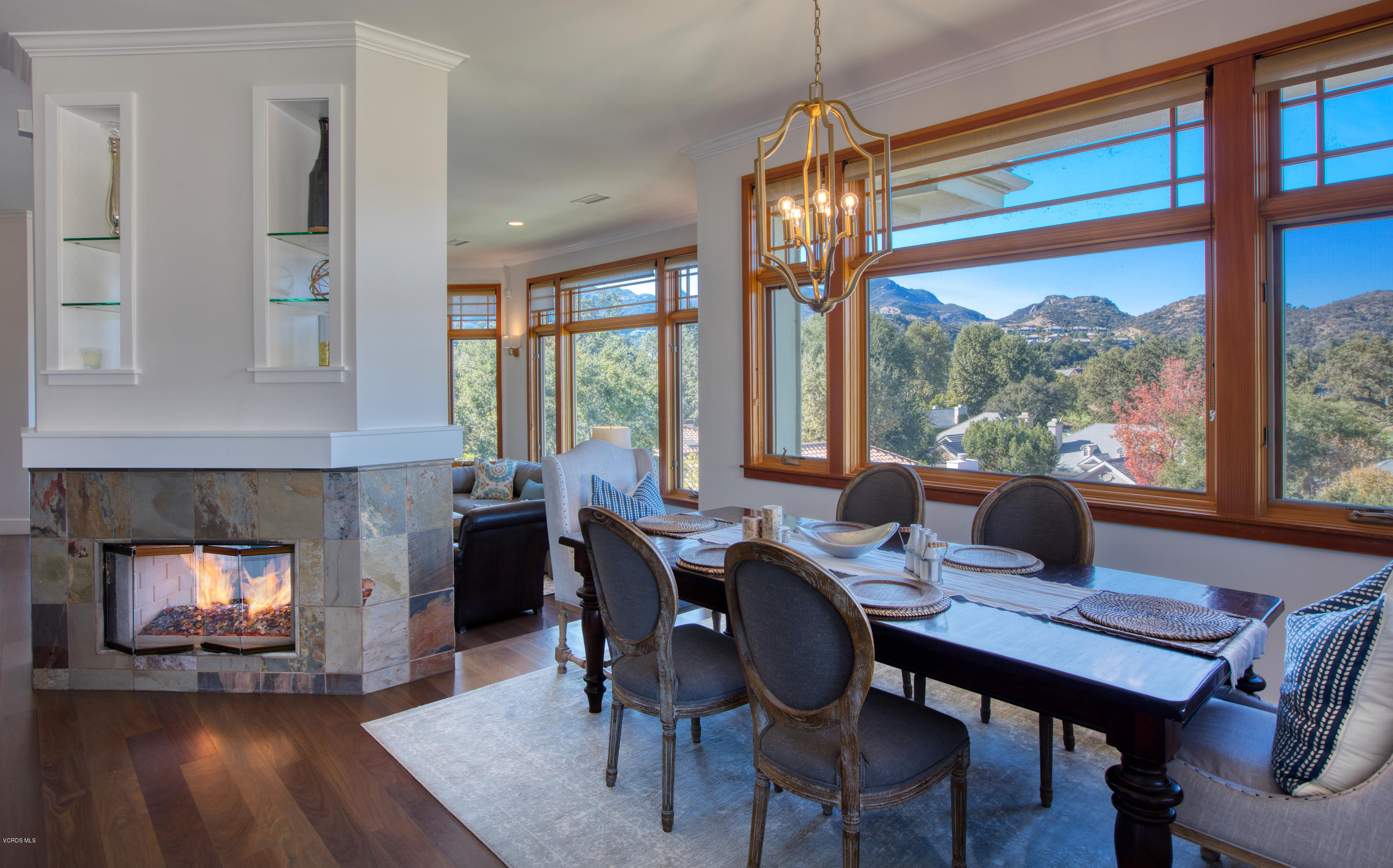 55 Upper Lake Road Westlake Village, CA 91361 - Photo 27 of 40 a view of a dining room with furniture window and wooden floor