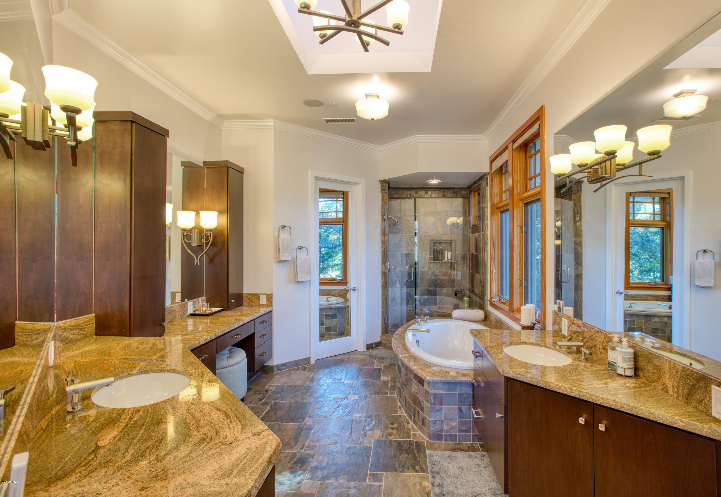 55 Upper Lake Road Westlake Village, CA 91361 - Photo 5 of 40 a spacious bathroom with a double vanity sink a mirror and a shower