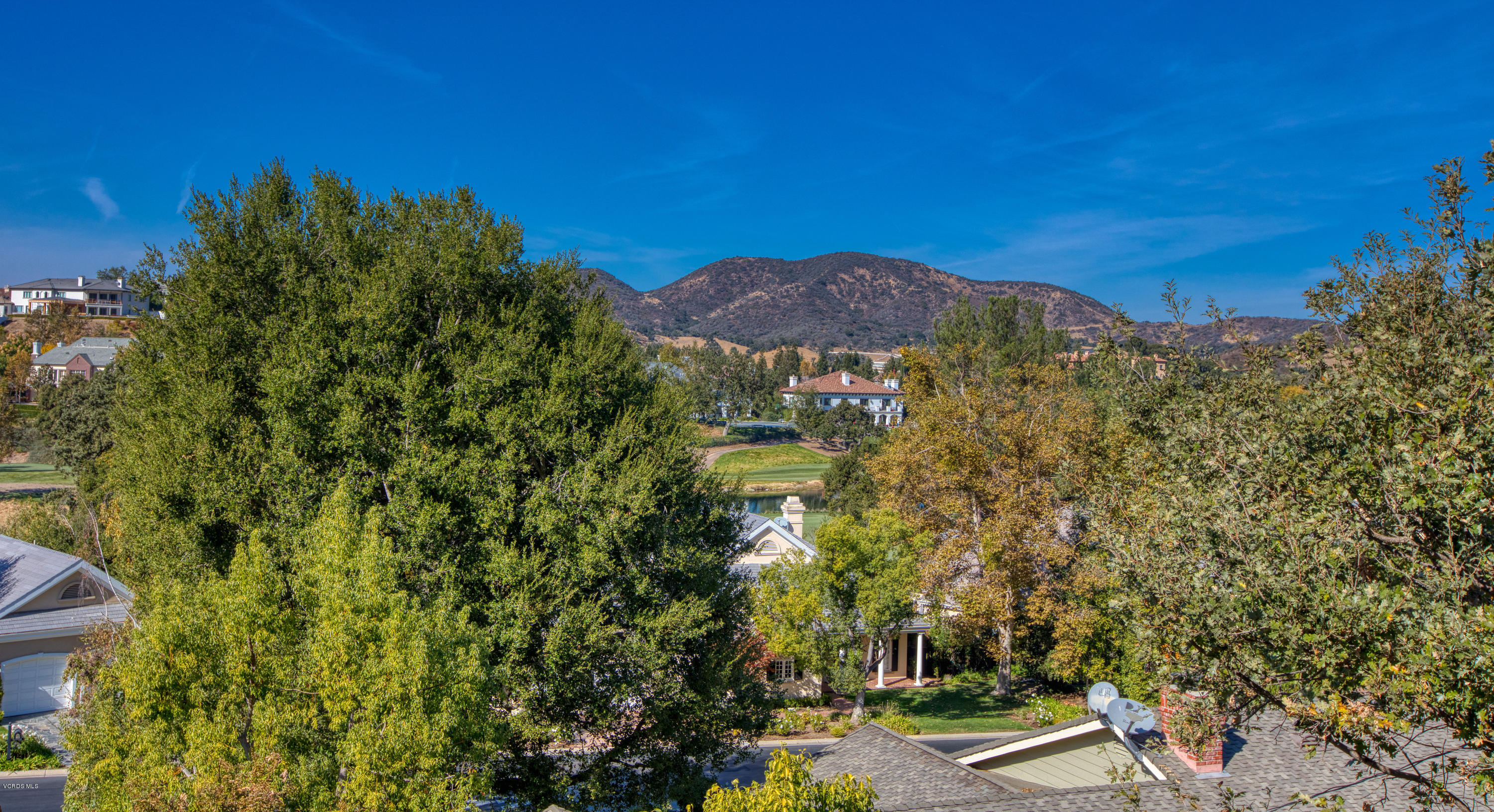 55 Upper Lake Road Westlake Village, CA 91361 - Photo 6 of 40 a view of a large yard with swimming pool and trees