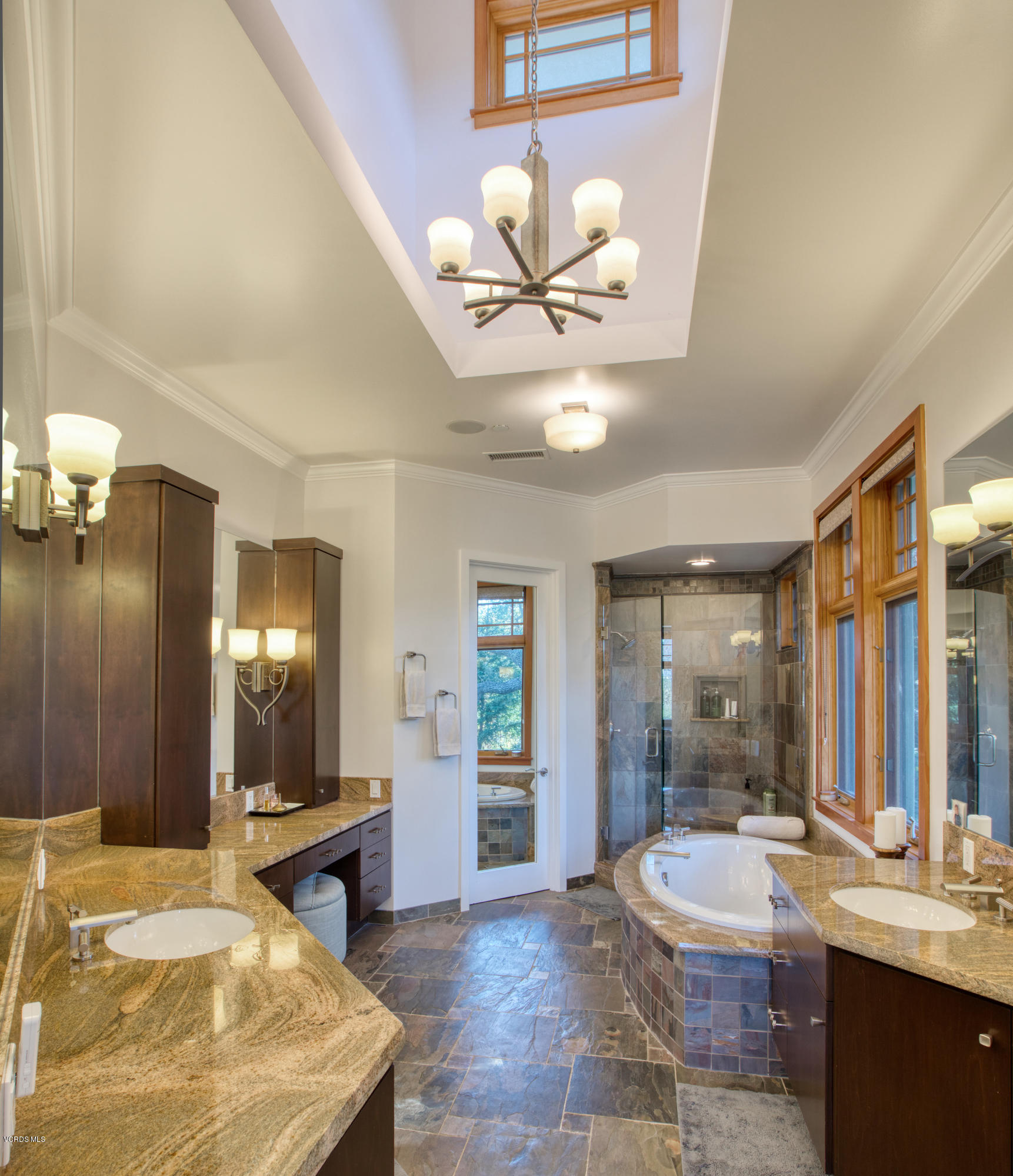 55 Upper Lake Road Westlake Village, CA 91361 - Photo 10 of 40 a view of a bathroom sink and a mirror