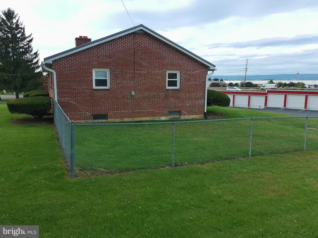 a house view with a garden space