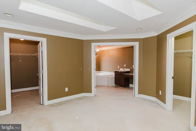 a kitchen with stainless steel appliances granite countertop a stove oven and a refrigerator