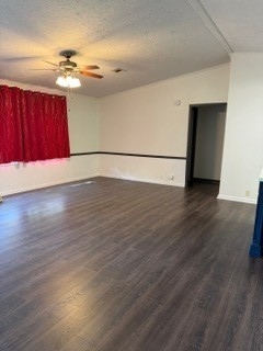 215 Parrish Street New Waverly, TX 77358 - Photo 11 of 12 an empty room with wooden floor and windows