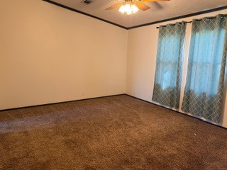 215 Parrish Street New Waverly, TX 77358 - Photo 4 of 12 a view of an empty room