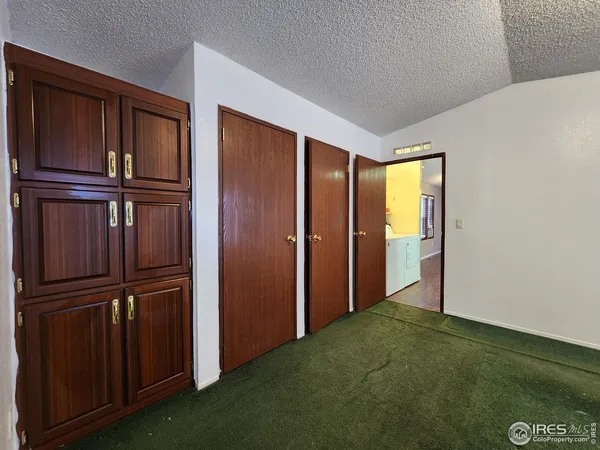 a view of empty room with windows