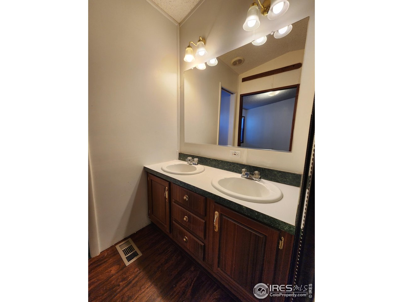 5000 Butte Street, Unit 208 Boulder, CO 80301 - Photo 23 of 37 a bathroom with a sink and a mirror