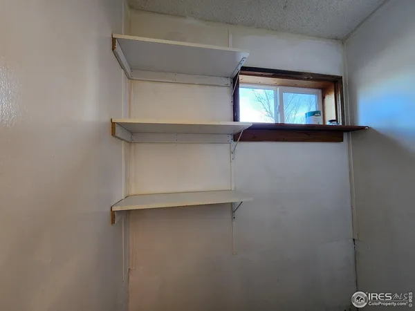 a view of a livingroom with a staircase
