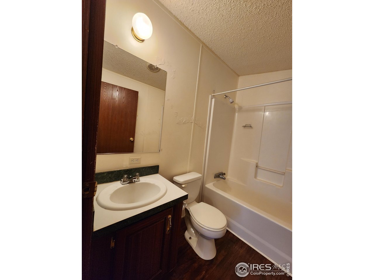 5000 Butte Street, Unit 208 Boulder, CO 80301 - Photo 27 of 37 a bathroom with a sink toilet and shower