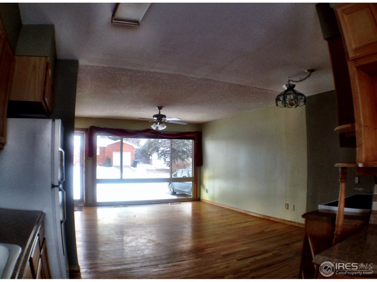 2428 West 24th Street Road Greeley, CO 80634 - Photo 3 of 25 Living Area viewed from Open Kitchen!