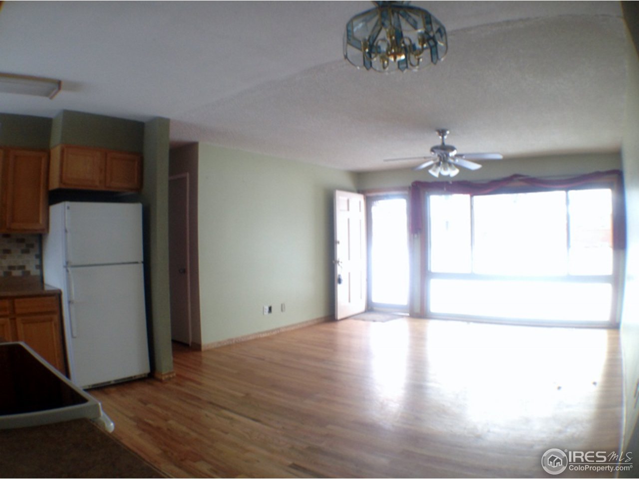 2428 West 24th Street Road Greeley, CO 80634 - Photo 5 of 25 Notice the Floor to Ceiling Front Living Window!