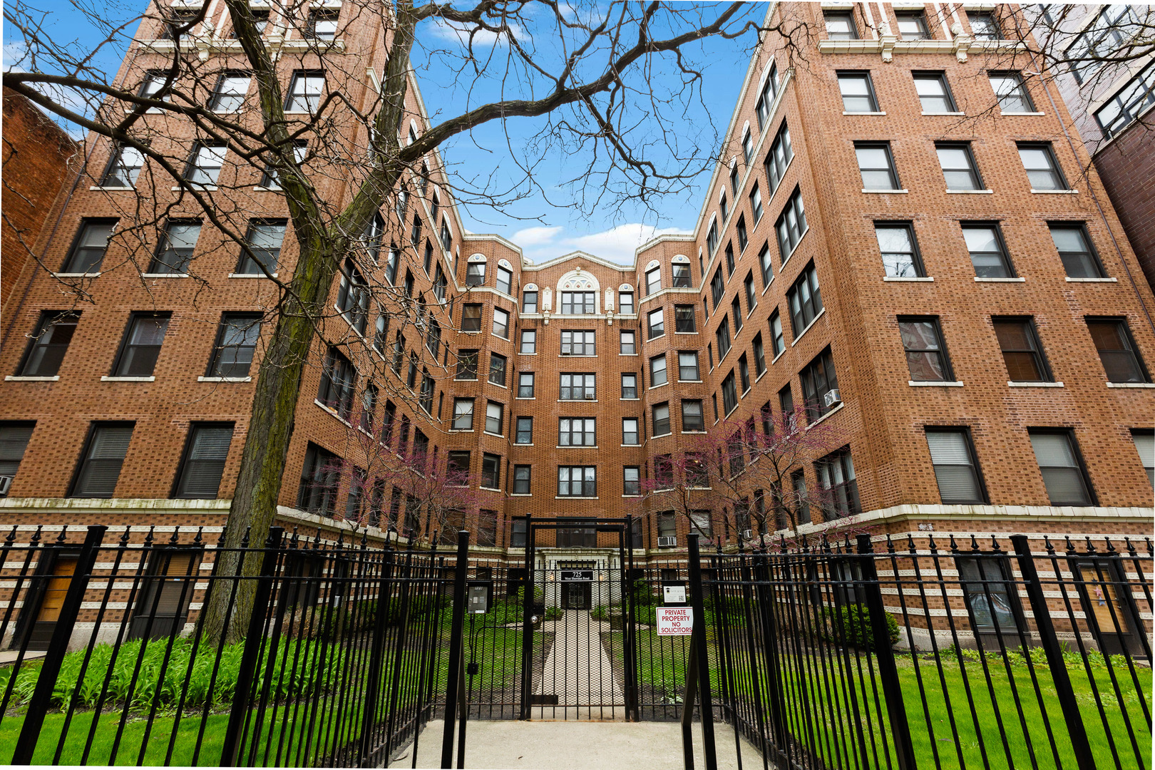 725 West Sheridan Road, Unit 506 Chicago, IL 60613 - Photo 1 of 14 a view of building with front door