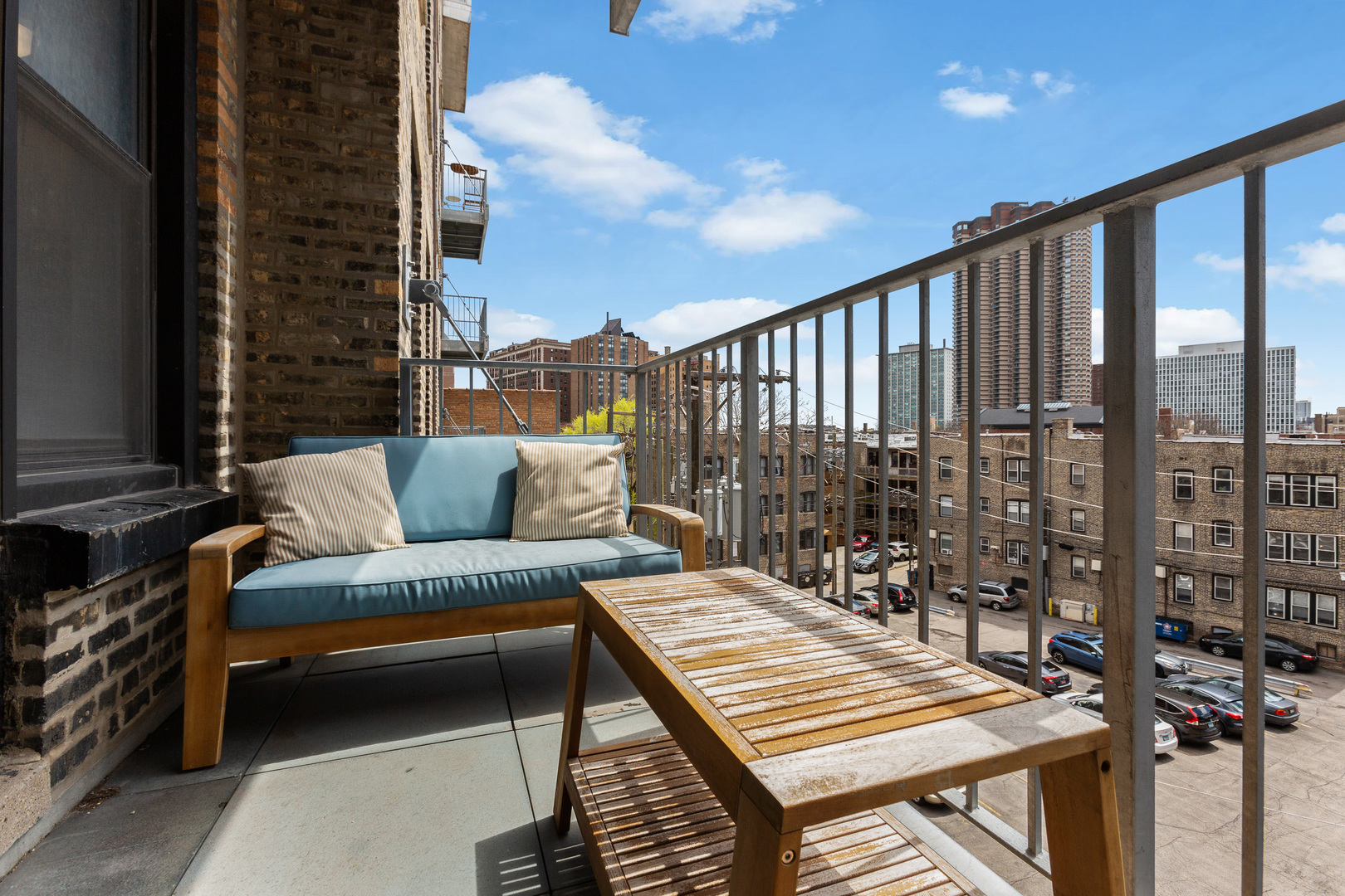 725 West Sheridan Road, Unit 506 Chicago, IL 60613 - Photo 11 of 14 a view of balcony with couch