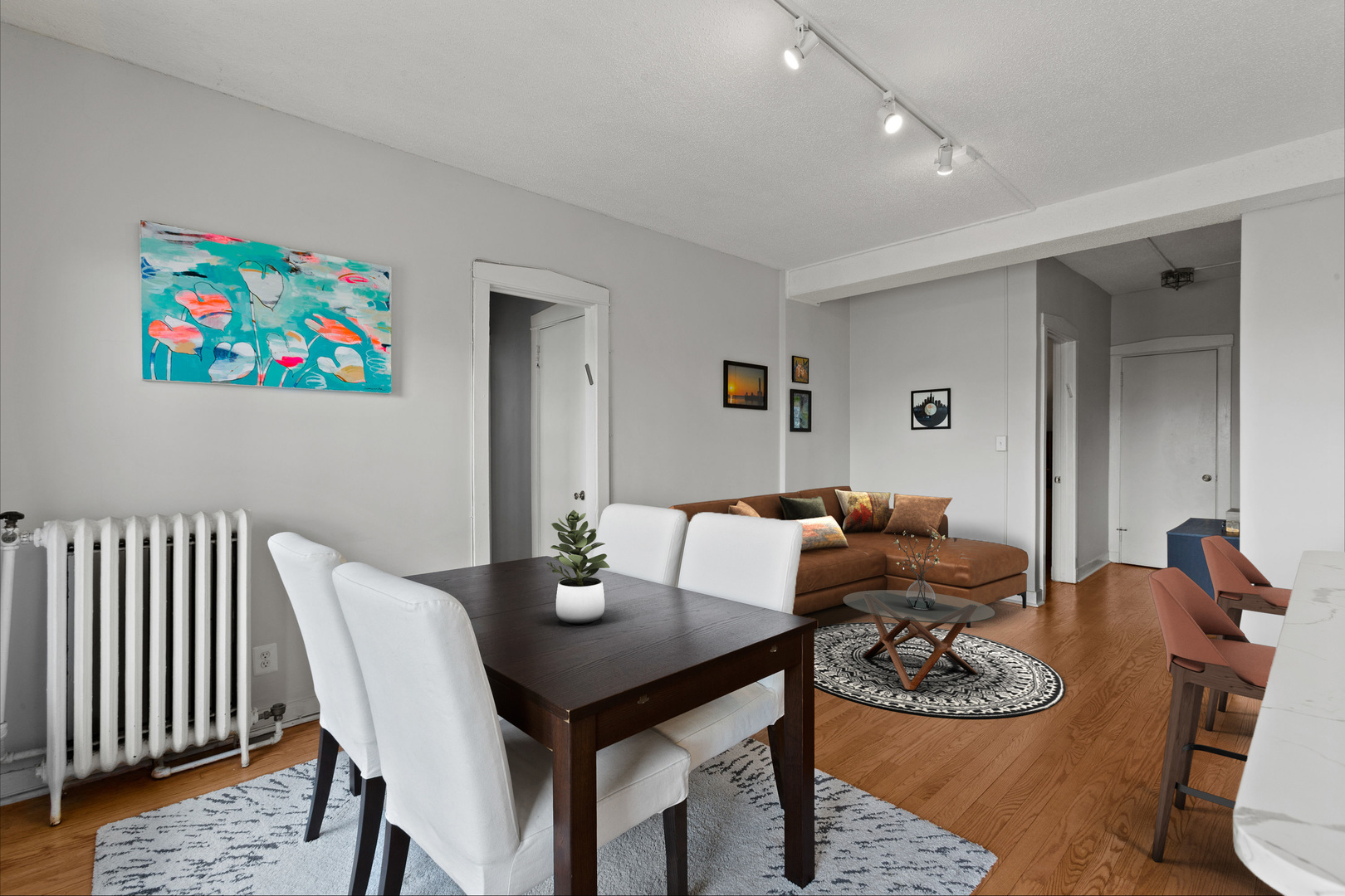 725 West Sheridan Road, Unit 506 Chicago, IL 60613 - Photo 3 of 14 a view of a dining room with furniture