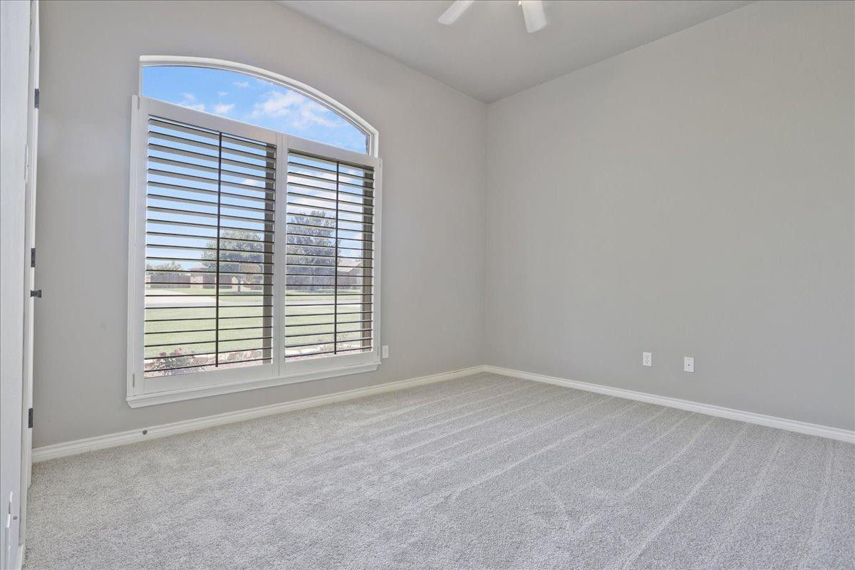 6304 County Road 7475 Lubbock, TX 79424 - Photo 21 of 28 a view of an empty room with a window