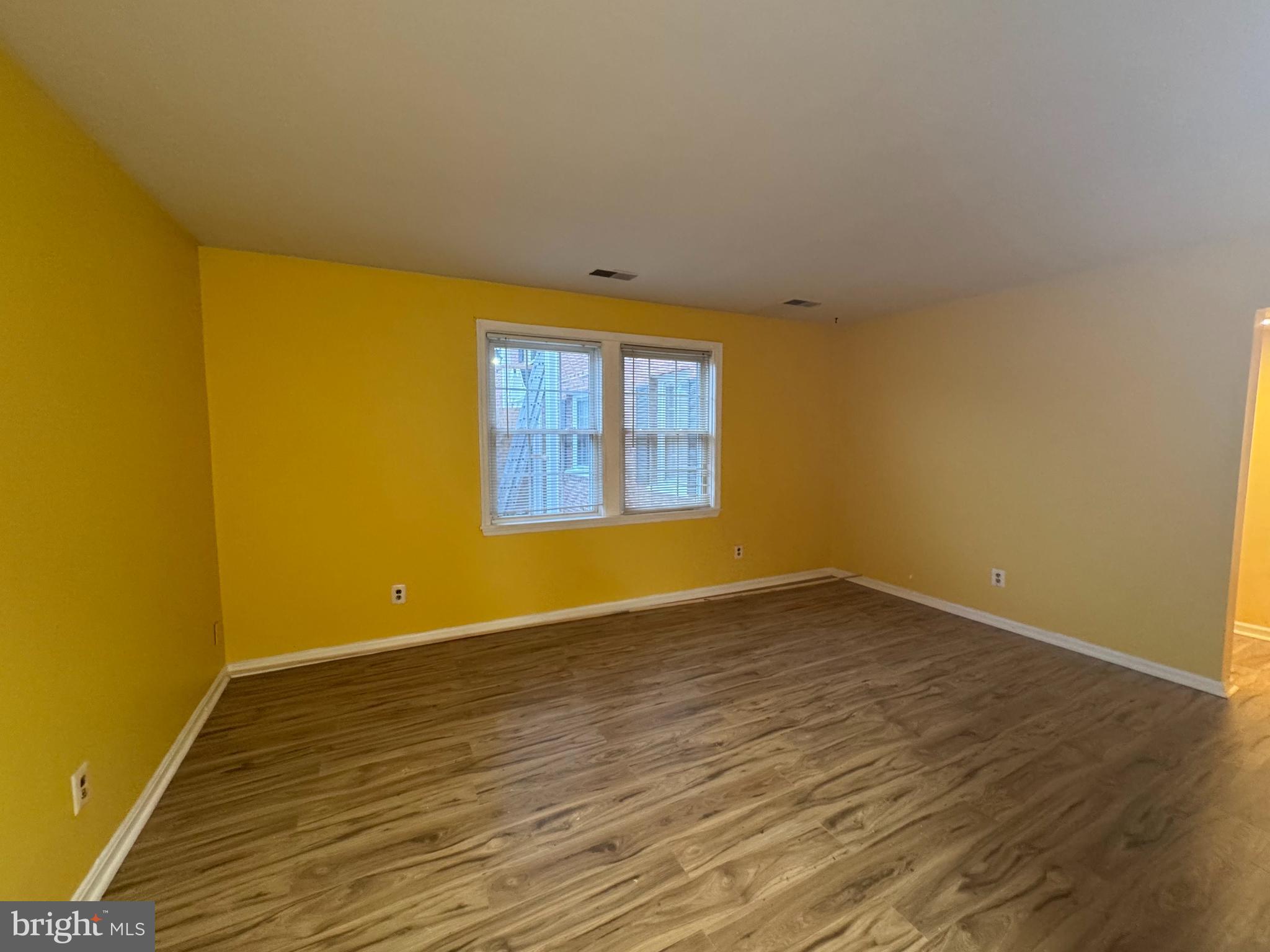 3812 W Street Southeast, Unit 101 Washington, DC 20020 - Photo 7 of 17 Formal living room with natural lighting