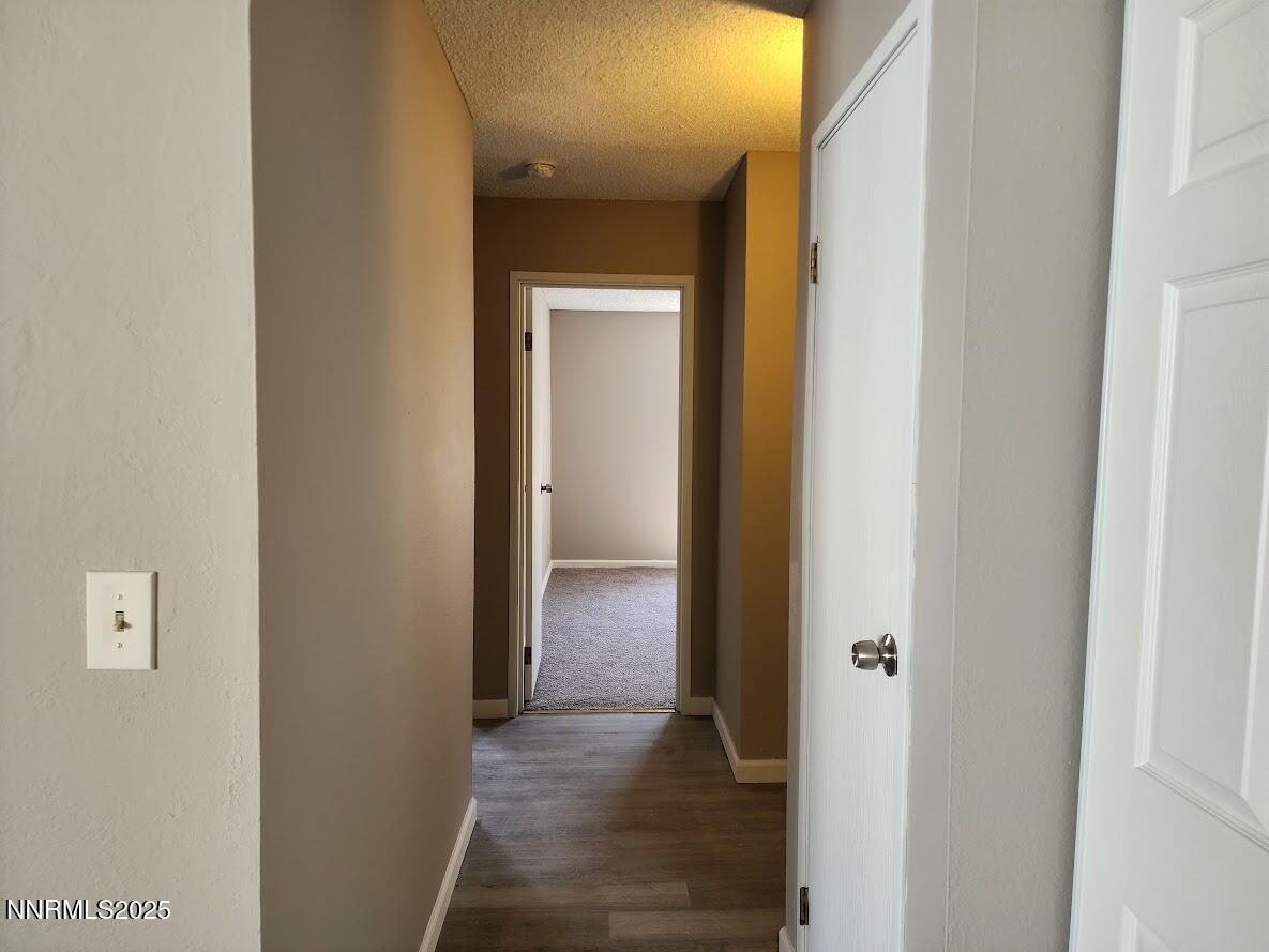 4604 Neil Road, Unit 142 Reno, NV 89502 - Photo 12 of 23 a view of a livingroom from a hallway