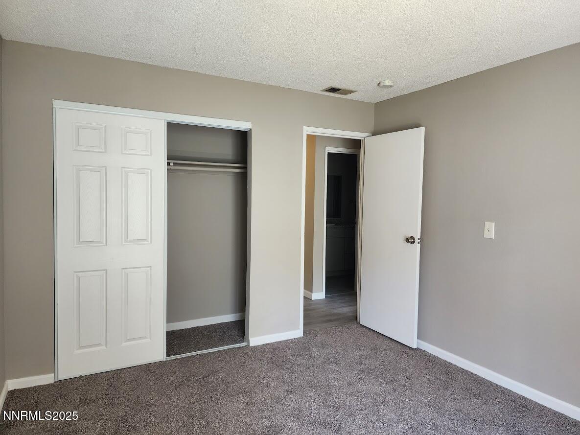 4604 Neil Road, Unit 142 Reno, NV 89502 - Photo 14 of 23 a view of an empty room and closet area