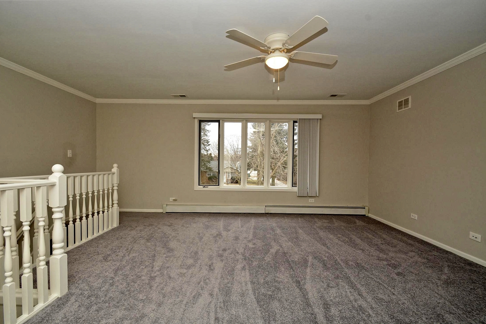 6138 Birmingham Street Chicago Ridge, IL 60415 - Photo 23 of 26 an empty room with wooden floor and windows