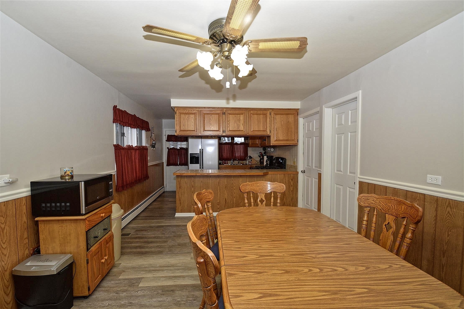 6138 Birmingham Street Chicago Ridge, IL 60415 - Photo 7 of 26 a bedroom with a bed and wooden floor