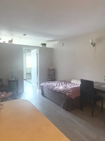 a bedroom with a bed and furniture